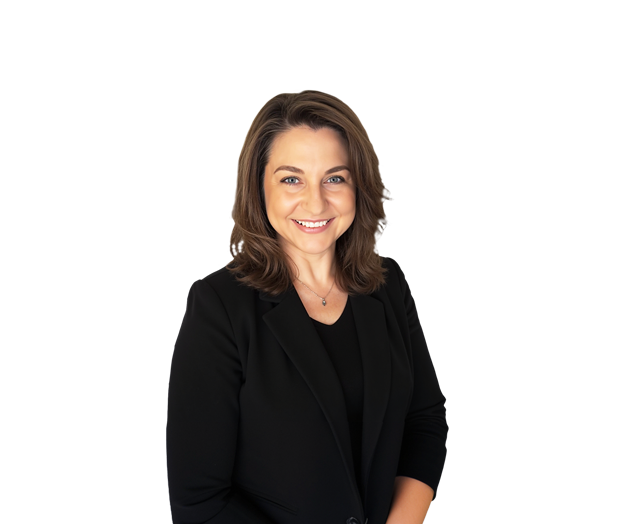 Woman with shoulder-length brown hair wearing a black blazer and top, smiling, posed against a plain white background.